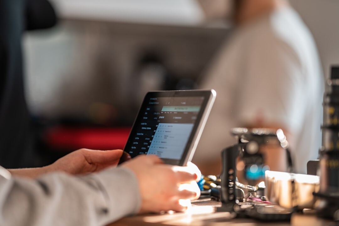 Producer checking a broadcast rundown on a tablet