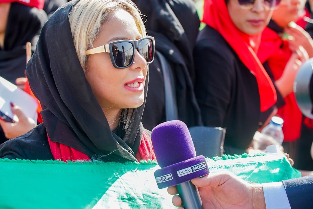 Journalist interviewing a source with a microphone